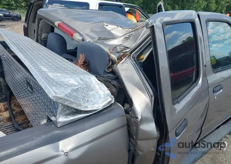 2003 Nissan Frontier Xe-V6 z USA, uszkodzony, nr VIN 1N6ED29XX3C441446